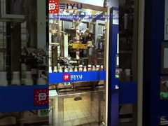 04-11 ডাবল হেড স্লিভ লেবেলিং মেশিন গ্রাহক সাইট স্লিভ লেবেল