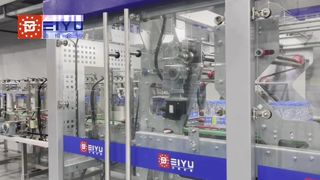 Carton wrapping machine used at a customer's site for a bottled mineral water production line