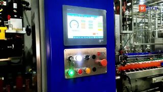 double-head sleeve labeling machine for a 48,000 BPH 400ml PET bottle energy drink production line