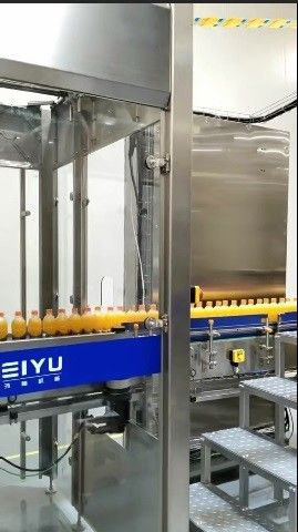 High-speed Fully Automatic Shrink Sleeve Label Labeling Machine For Orange Juice Beverage Production Line Customer Site