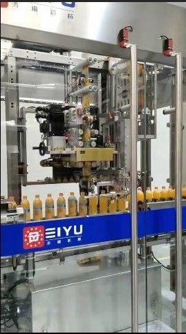 High-speed Fully Automatic Shrink Sleeve Label Labeling Machine For Orange Juice Beverage Production Line Customer Site