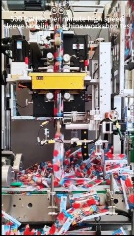 Fifth Generation Fully Automatic Shrink Sleeve Applicator Customized For 30000BPH Drinks Production Line Is Being Tested In The Workshop