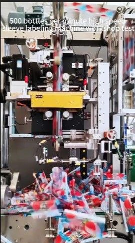 Fifth Generation Fully Automatic Shrink Sleeve Applicator Customized For 30000BPH Drinks Production Line Is Being Tested In The Workshop