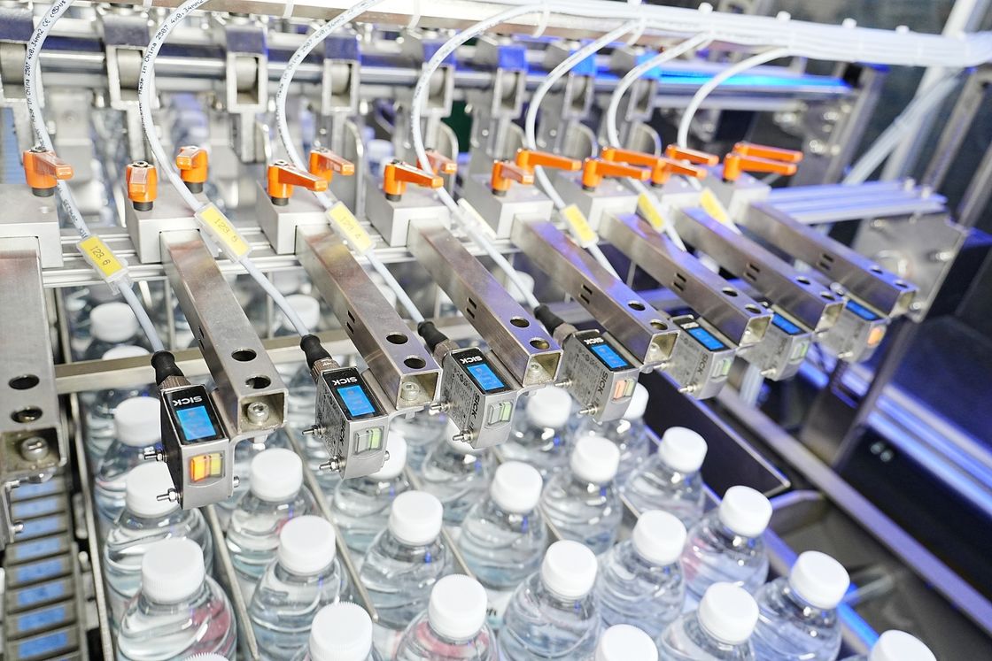 ODM Automated 80 Packs Per Hour Heat Shrink Film Packaging Machine Packer Shrink Wrap Machine For Bottled Water Production Line