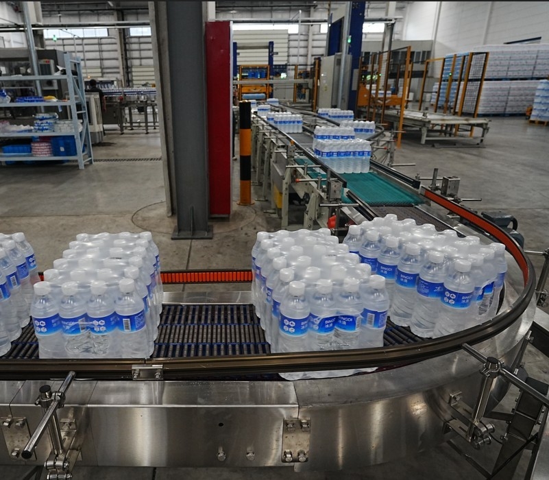 Automated stacking and conveying system for bottled water production High Efficiency Packaging Solution