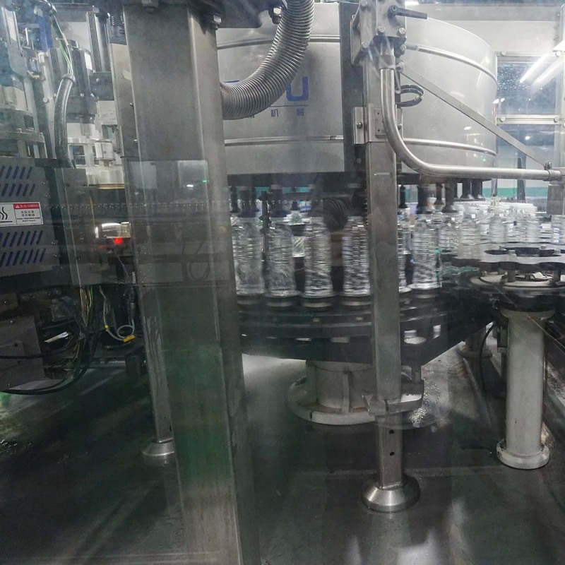 26,000 Bph Salty Soda End of Line Packaging Machine with Mildew Proof Packaging for Beverage Production