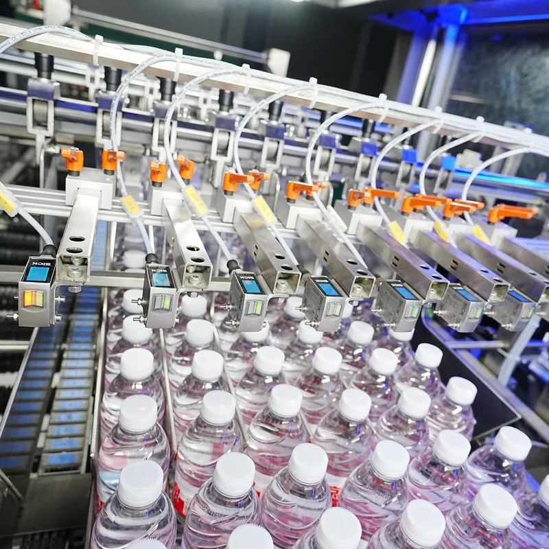 Full Automatic Heat Shrink Film Packaging Machine with Stainless Steel Heating for 12,000 to 48,000 Bottles/Hour