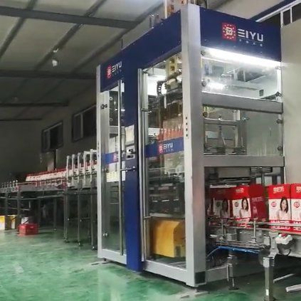 High-Speed 12000-36000 bottles/Hour Wrap Around Case Packer with Siemens PLC and Pneumatic Lifting Structure