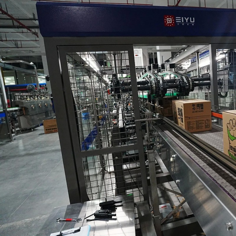 Fully Automatic 70 Carton Per Minute Stable Side-Feed Wrap Around Case Packer for Medical Applications