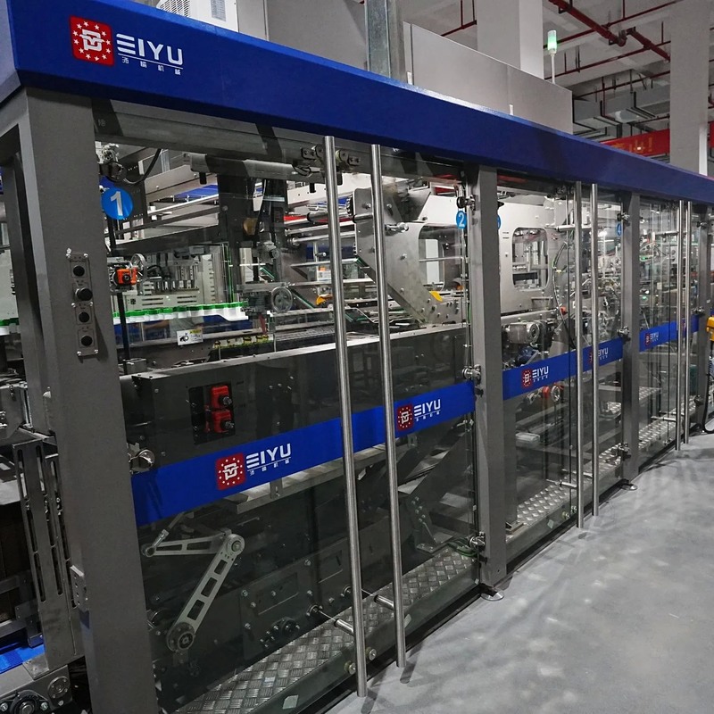 Fully Automatic 70 Carton Per Minute Stable Side-Feed Wrap Around Case Packer for Medical Applications