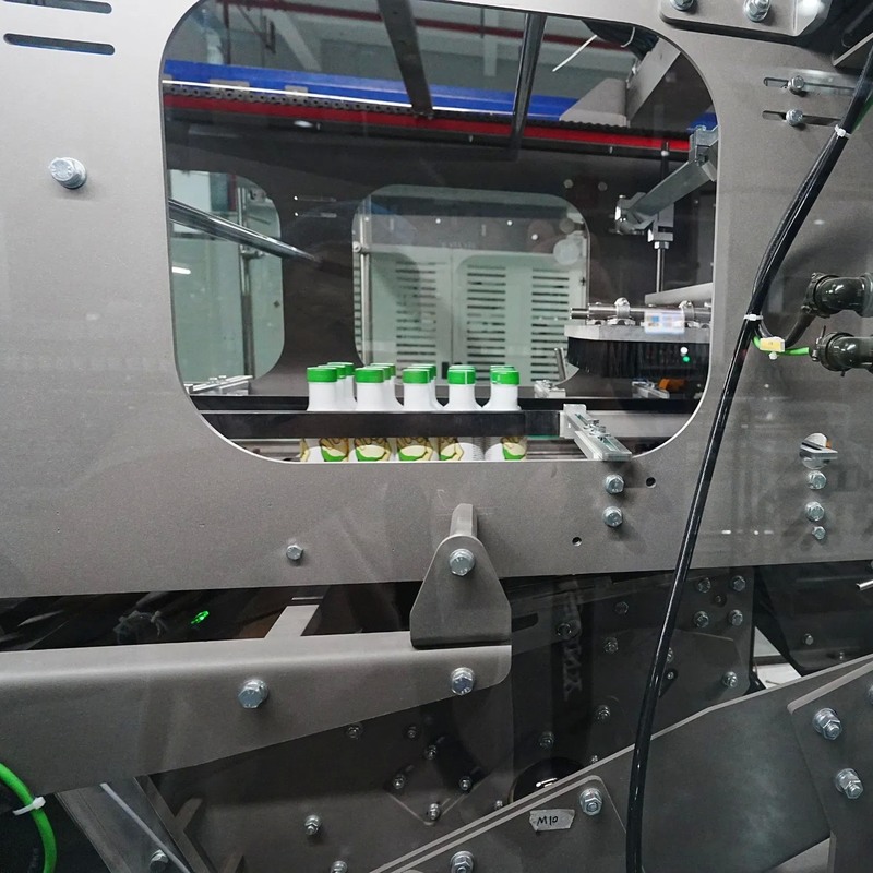 Stable Performance CE ISO Certified Wrap Around Case Packer with Touch Screen Control for Bottles Jars Cans