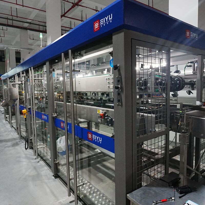 High-speed fully automatic narrow-edge wrap around case packer with 80 packs per minute capacity